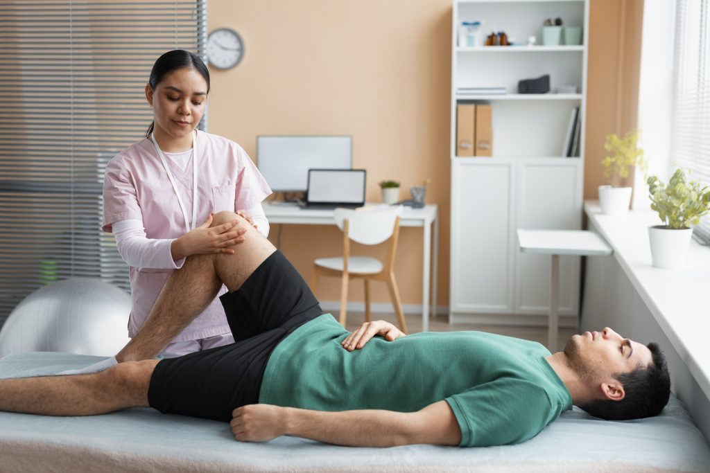 a pelvic floor physical therapy professional working on a client. 