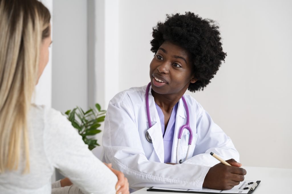 A doctor assessing a patients pelvic floor issues.
